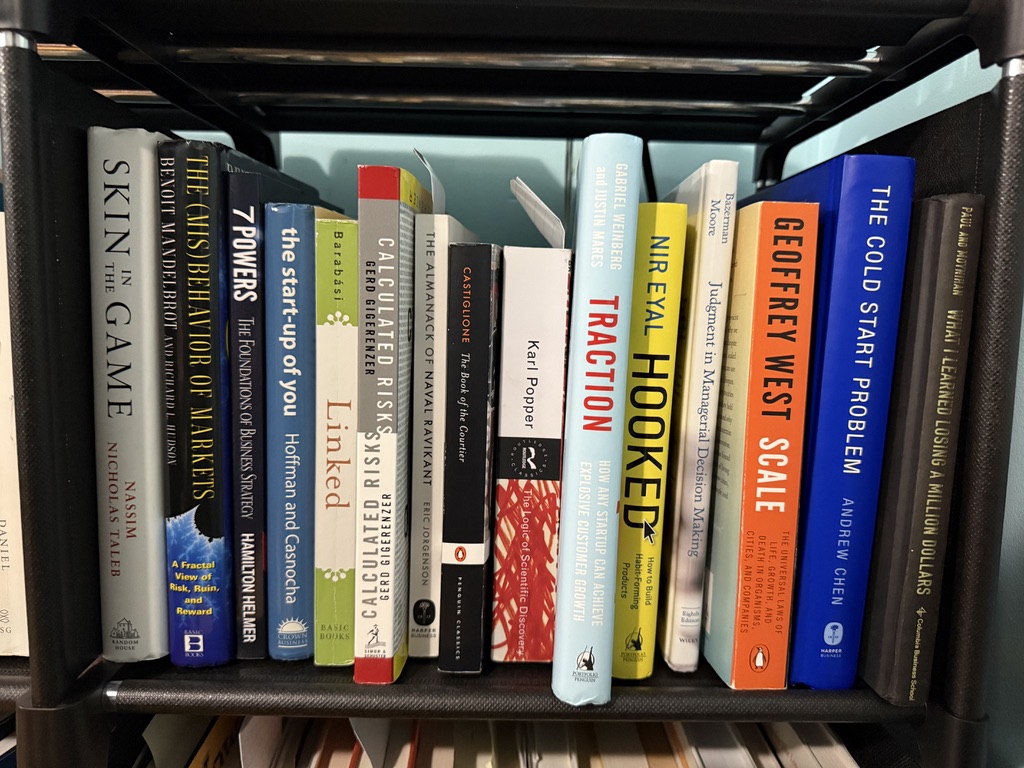 Bookshelf with startup strategy titles